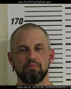 Mugshot of Andrew Steven Martens booked in Scott County, Iowa on August 22, 2026