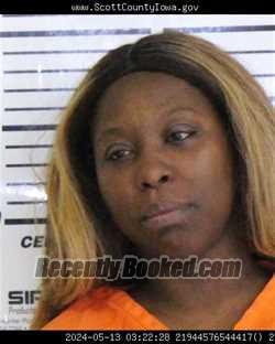 Mugshot of TENIKA DENISE MITCHELL booked in Scott County, Iowa on March 31, 2026