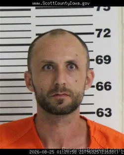 Mugshot of Lucas Robert Simpson booked in Scott County, Iowa on August 25, 2026