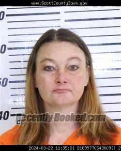 Mugshot of CANDACE LYNN NEWCOMB booked in Scott County, Iowa on May 13, 2026