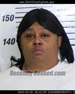 Mugshot of ERICA MONIQUE COLEMAN booked in Scott County, Iowa on April 21, 2026