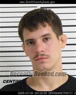 Mugshot of KODY MICHAEL BURKE booked in Scott County, Iowa on May 8, 2026