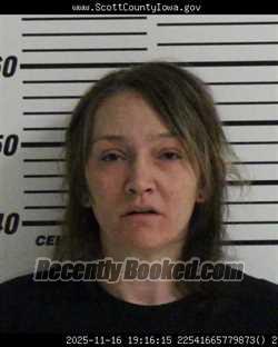 Mugshot of ALISA MARIE NEWTON booked in Scott County, Iowa on April 22, 2026