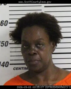 Mugshot of Lora Ann Burrage booked in Scott County, Iowa on September 3, 2026