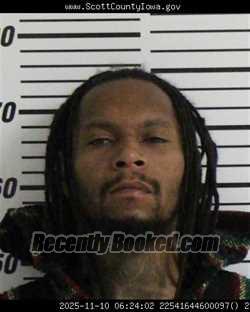 Mugshot of QURAN RAHMEL HOLT booked in Scott County, Iowa on March 31, 2026