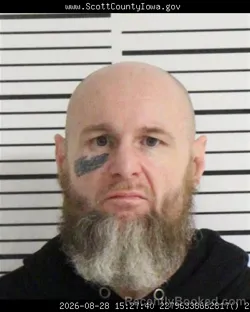 Mugshot of Michael James Roe booked in Scott County, Iowa on August 28, 2026