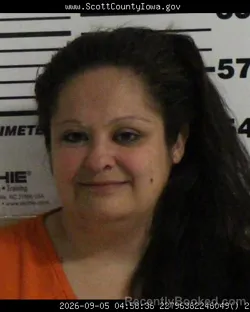 Mugshot of Emily Leann Owusu booked in Scott County, Iowa on September 5, 2026