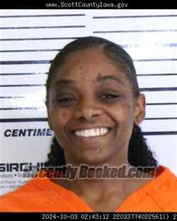 Mugshot of PARRIS DENISE CLAYTON booked in Scott County, Iowa on March 31, 2026