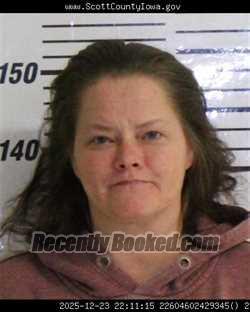 Mugshot of CARRIE ANN TRACY booked in Scott County, Iowa on April 22, 2026