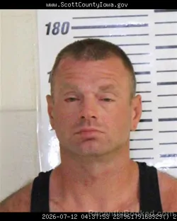 Mugshot of CHRISTIAN GERARD DYKSTRA booked in Scott County, Iowa on July 12, 2026