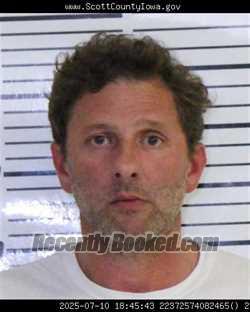 Booking photo from Scott County, Iowa