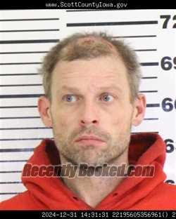 Booking photo from Scott County, Iowa