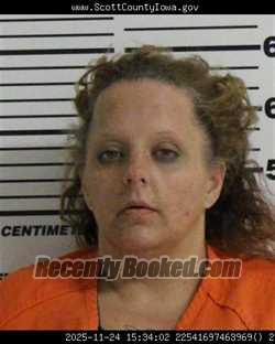 Mugshot of ASHLEY ANN MCMURTREY booked in Scott County, Iowa on April 30, 2026
