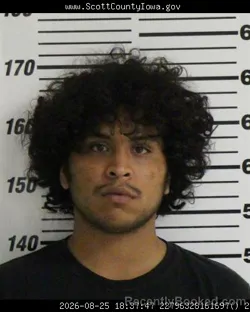 Mugshot of Rene Antonio Martinez booked in Scott County, Iowa on August 25, 2026