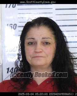 Mugshot of ANDREA NANETTE PRESTON booked in Scott County, Iowa on March 27, 2026