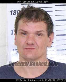 Mugshot of BRANDON RUSSELL MISHAK booked in Scott County, Iowa on March 26, 2026