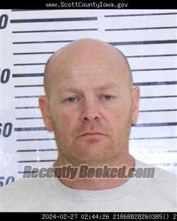 Booking photo from Scott County, Iowa