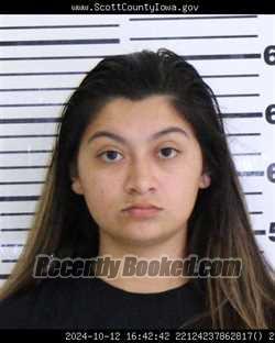 Mugshot of ALYANA ISABELLA MORALES booked in Scott County, Iowa on April 21, 2026