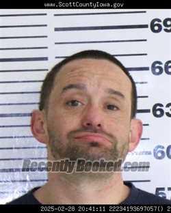 Mugshot of JASON CHRISTOPHER ROMO booked in Scott County, Iowa on April 23, 2026