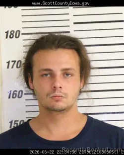 Mugshot of DONOVAN WILLIAM DANI MEADOR booked in Scott County, Iowa on June 22, 2026
