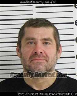 Mugshot of JOHN KENNETH SANDUSKY booked in Scott County, Iowa on May 18, 2026