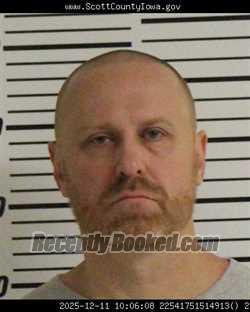 Mugshot of MICHAEL DENNIS CLARK booked in Scott County, Iowa on April 27, 2026
