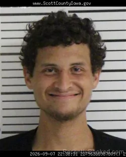 Mugshot of Christian David Manuel Cruz booked in Scott County, Iowa on September 7, 2026