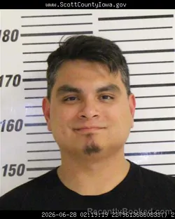 Mugshot of ROMAN ANDRES FUENTES booked in Scott County, Iowa on June 28, 2026