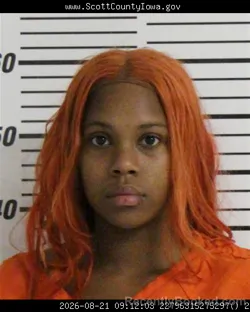 Mugshot of Dnaria Monique Busby booked in Scott County, Iowa on August 21, 2026