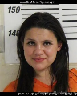 Mugshot of Emily Ann Enriquez booked in Scott County, Iowa on August 22, 2026