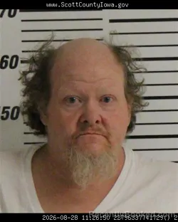 Mugshot of Tad Arden Job booked in Scott County, Iowa on August 28, 2026