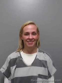 Mugshot of ASHLEE MARIE PETERSON booked in Sioux County, Iowa on April 12, 2026