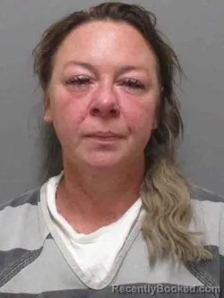 Mugshot of HEIDI LYNN HOOYER booked in Sioux County, Iowa on April 24, 2026