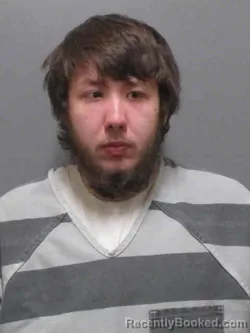 Mugshot of ALEX MATTHEW SMITH booked in Sioux County, Iowa on March 21, 2026