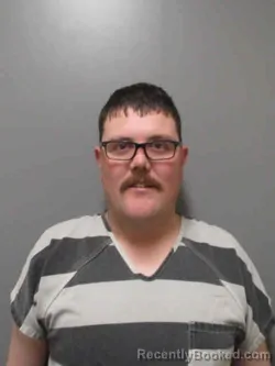 Mugshot of TAYLOR RAY LESSARD booked in Sioux County, Iowa on March 23, 2026