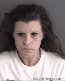 Mugshot of AMBER LYNN GRABAU booked in Story County, Iowa on March 25, 2026