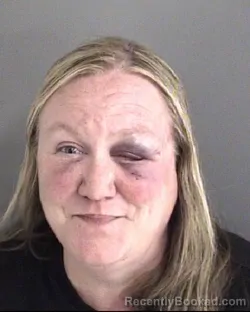 Mugshot of ANGELA MARIE HALLADAY booked in Story County, Iowa on March 22, 2026