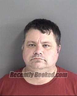 Booking photo from Story County, Iowa