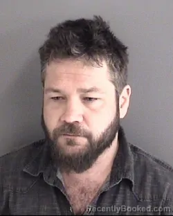 Mugshot of CORY VANCE ROBERTSON booked in Story County, Iowa on May 8, 2026