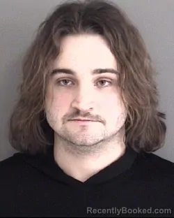 Mugshot of DYLAN MICHAEL HUGHES booked in Story County, Iowa on March 18, 2026