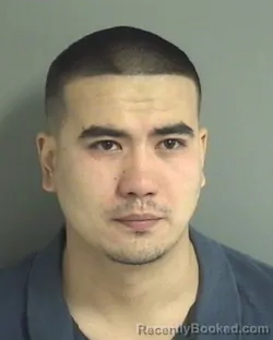 Mugshot of DAVRON PULATOVICH KHAMDAMOV