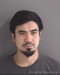 Mugshot of DAVRON PULATOVICH KHAMDAMOV booked in Story County, Iowa on May 27, 2026