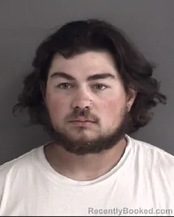 Mugshot of Ethan Joseph Ballard booked in Story County, Iowa on October 3, 2026