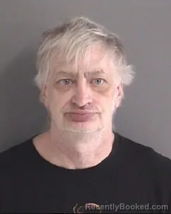 Mugshot of ERIC JOHN BAYSINGER booked in Story County, Iowa on April 2, 2026