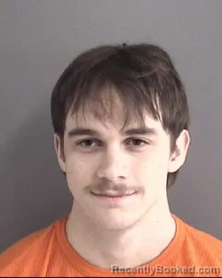 Mugshot of EVAN THOMAS NASON booked in Story County, Iowa on March 27, 2026