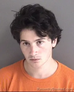 Mugshot of GRIFFIN DAVID MILLER booked in Story County, Iowa on May 10, 2026