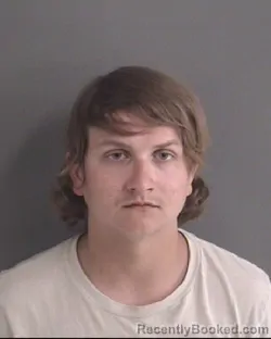 Mugshot of HUNTER SCOTT MILLER booked in Story County, Iowa on March 22, 2026