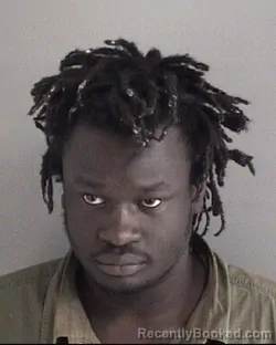 Mugshot of JONGLEI HALELUYA GARANG CHOL booked in Story County, Iowa on May 18, 2026