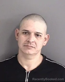 Mugshot of JUAN ISIDRO CARLOS BORREGO booked in Story County, Iowa on May 13, 2026
