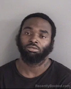 Mugshot of JU`COREY OMAR SANTREAL HIGGINS booked in Story County, Iowa on April 21, 2026